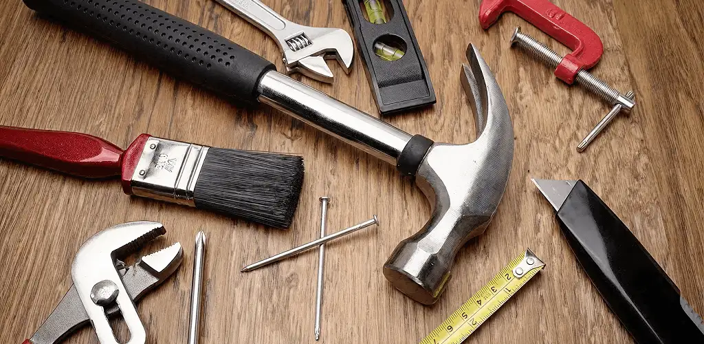 Handyman tools laid out for home repair and maintenance work in Kansas City, KS